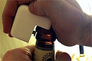Mac Power Adapter Works as Beer Bottle Opener
