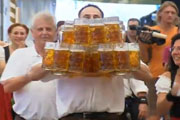 Craft Beer TheDrinkNation.com | Germany's Oliver Struempfel Sets New World Beer-Carrying Record  | The Drink Nation